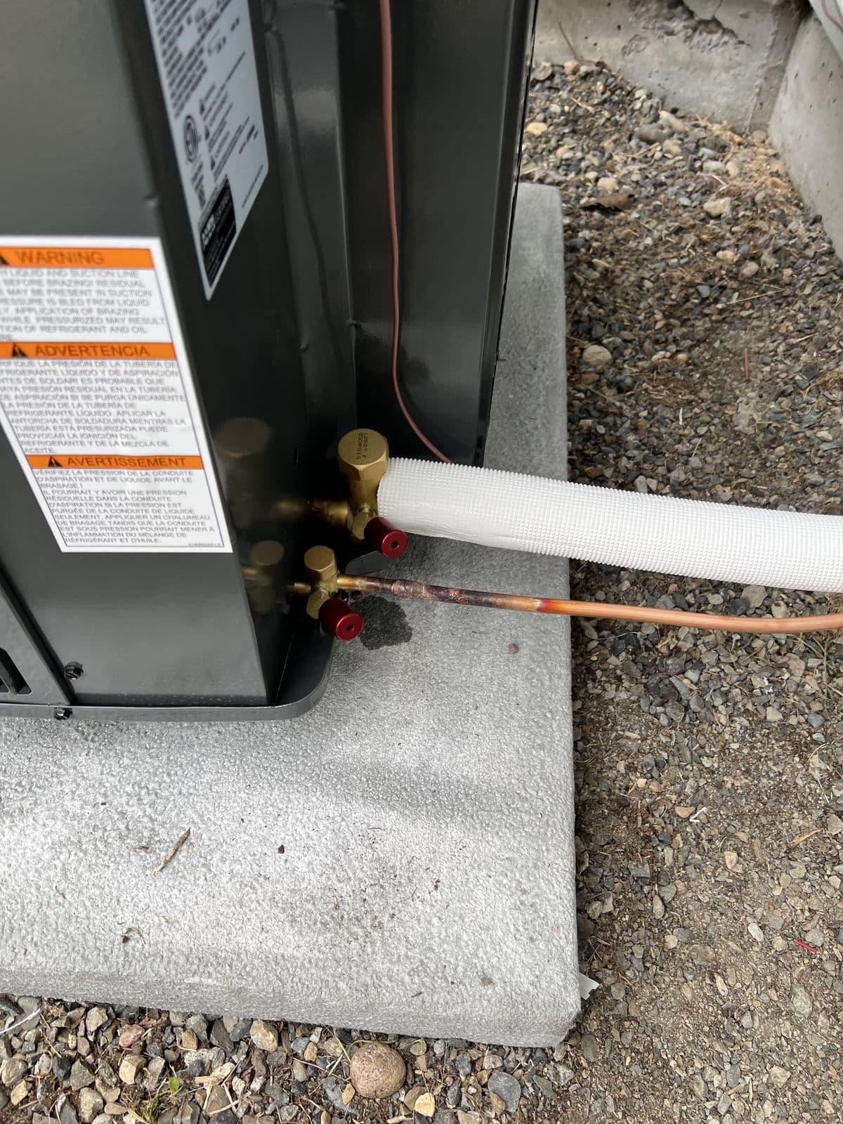 Service valve and line set on a concrete pad