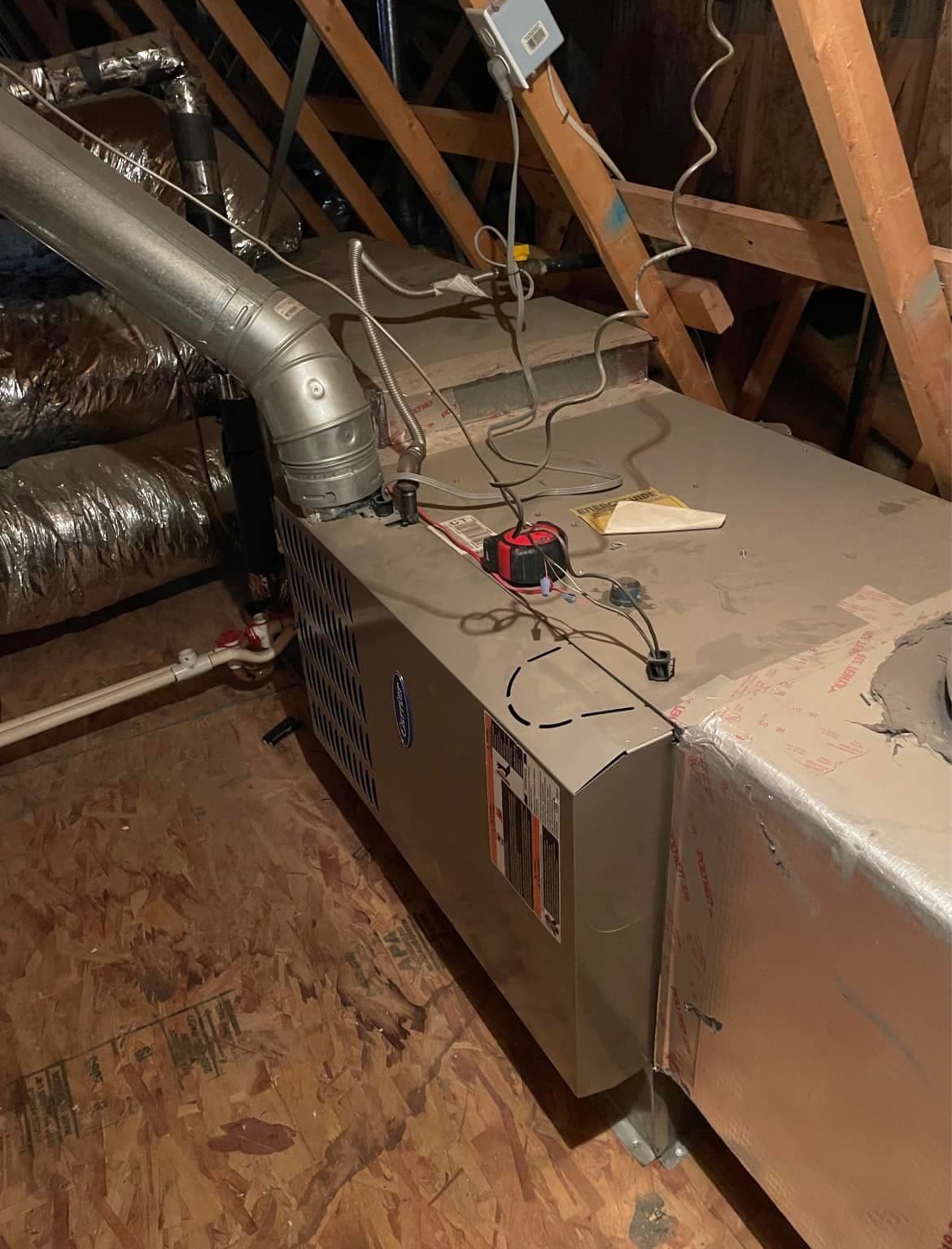 Attic furnace unit with ducts