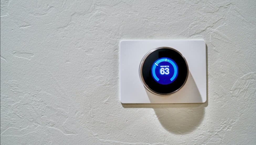 Smart thermostat on a textured wall