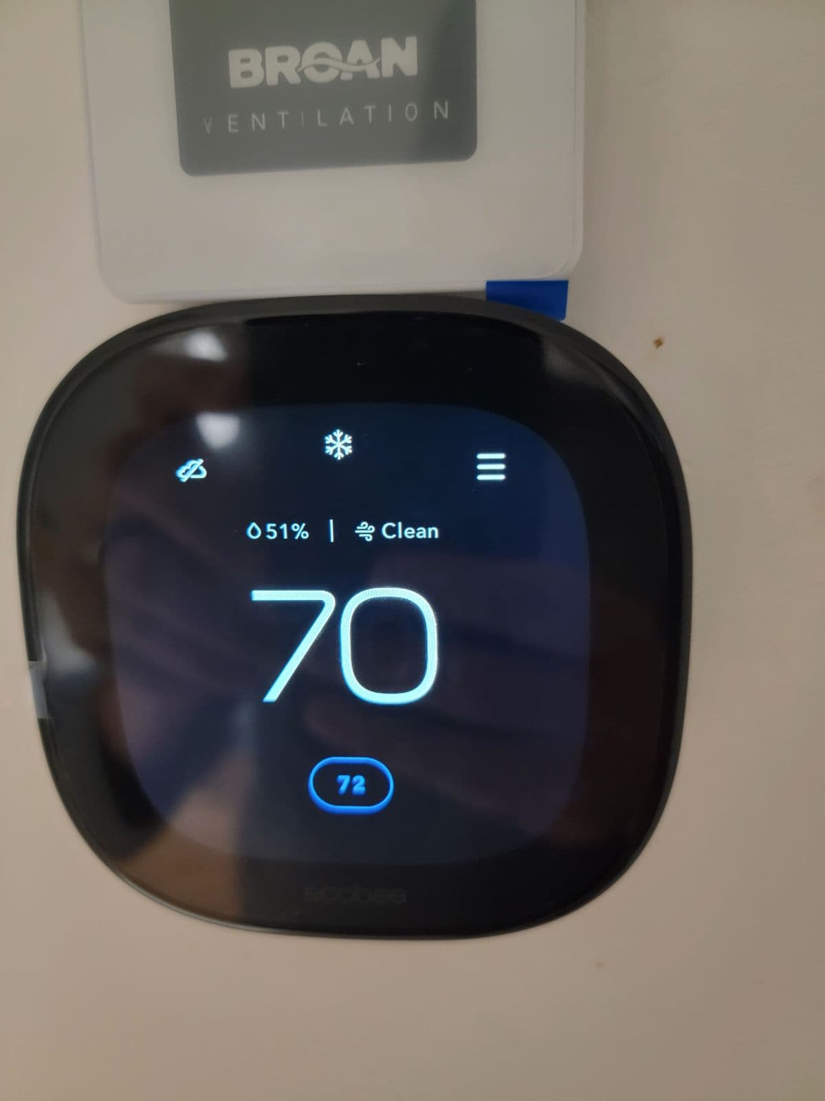 Touchscreen thermostat set to 70
