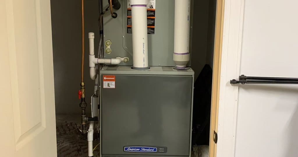 American Standard furnace in a closet
