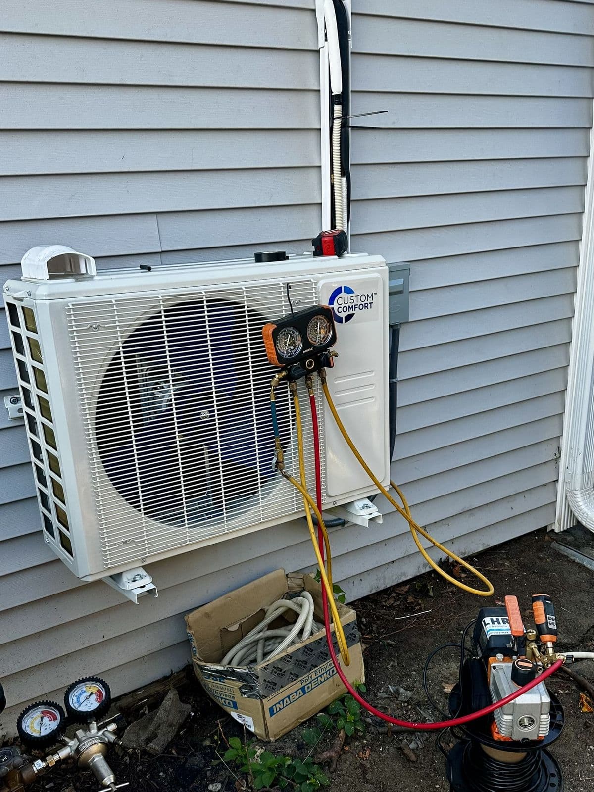 Ductless heat pump with gauges connected